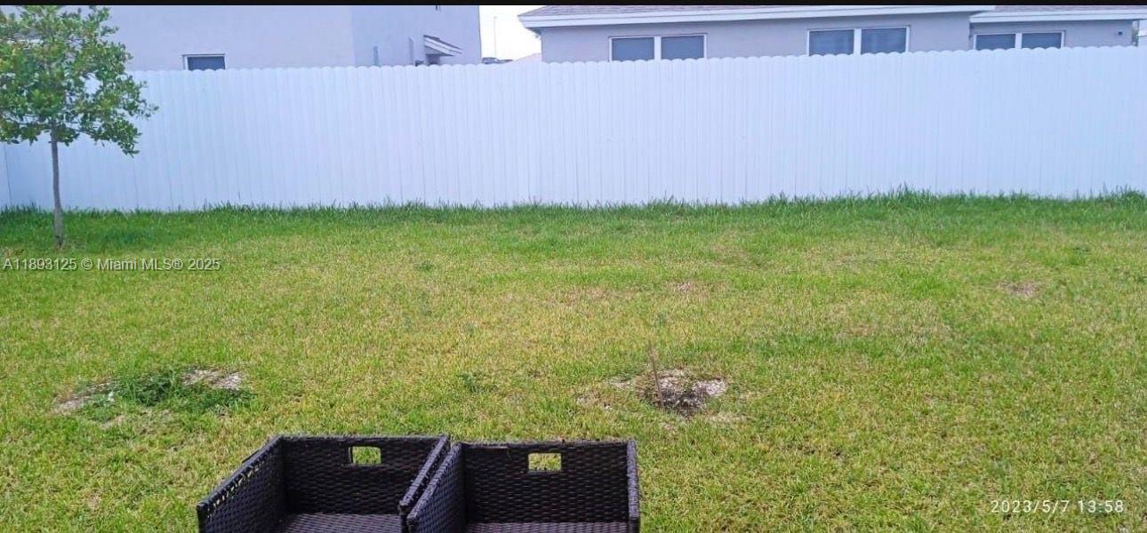 13219 Southwest 270th Terrace Homestead, FL 33032 - Photo 9 of 11 view of an outdoor space and a yard