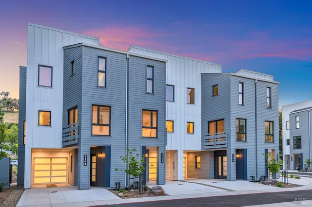 a front view of a building with street view