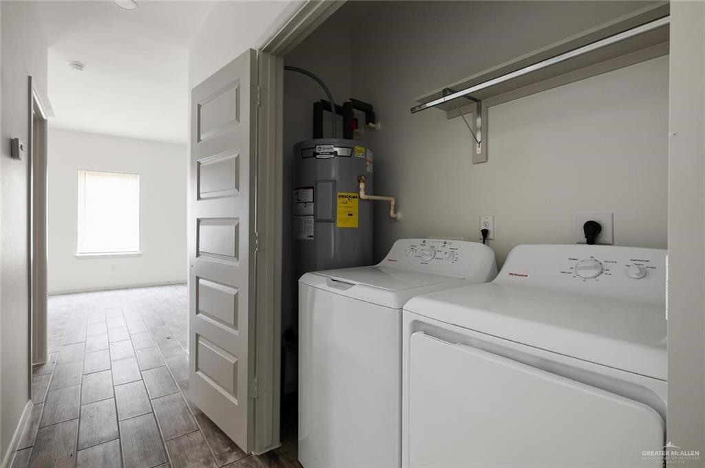 1308 Valle Vista Street, Unit 2 Alamo, TX 78516 - Photo 5 of 15 a utility room with dryer and washer