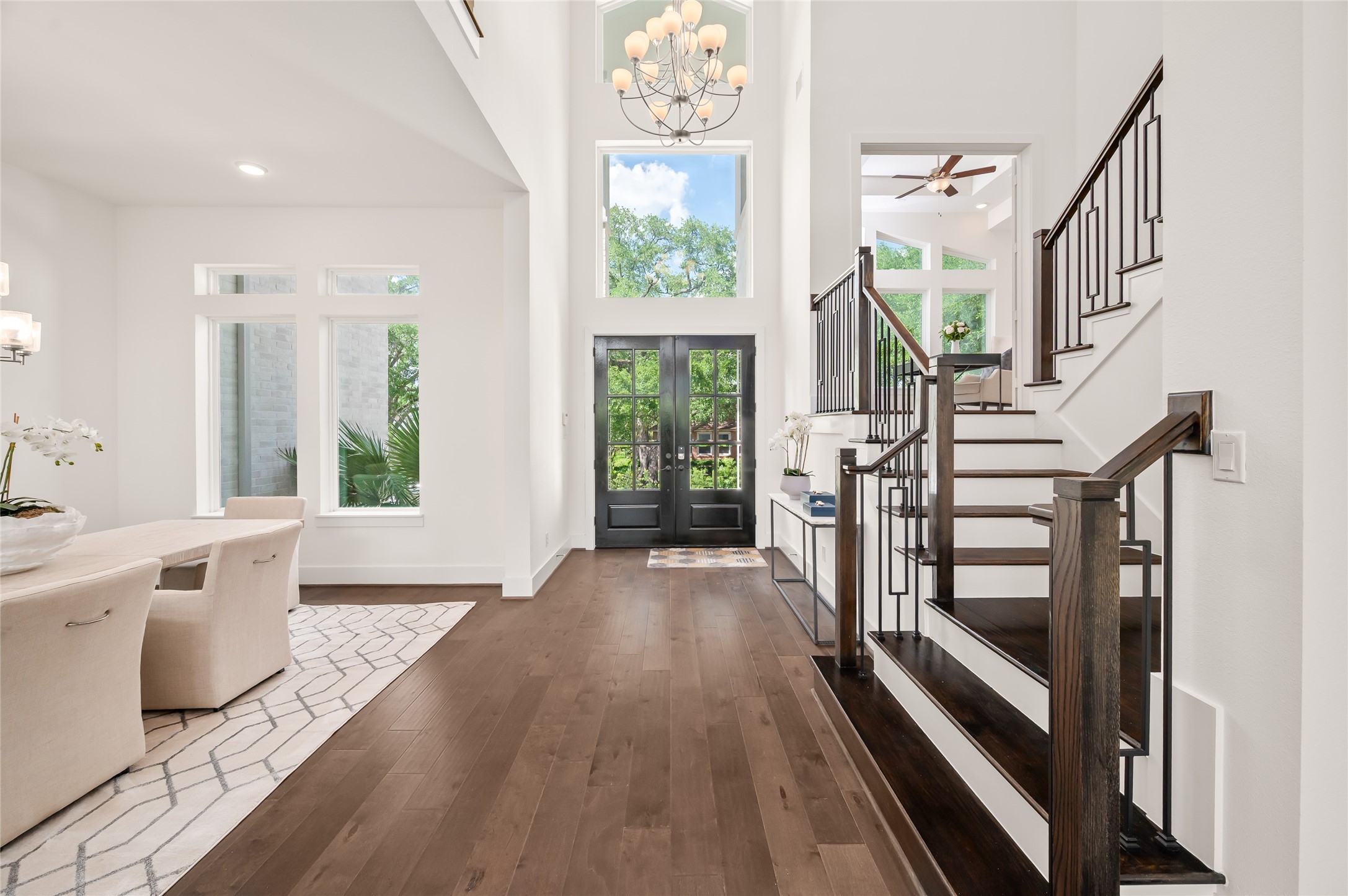 2215 MacArthur Street Houston, TX 77030 - Photo 3 of 33 a view of a hallway view with wooden floor and staircase