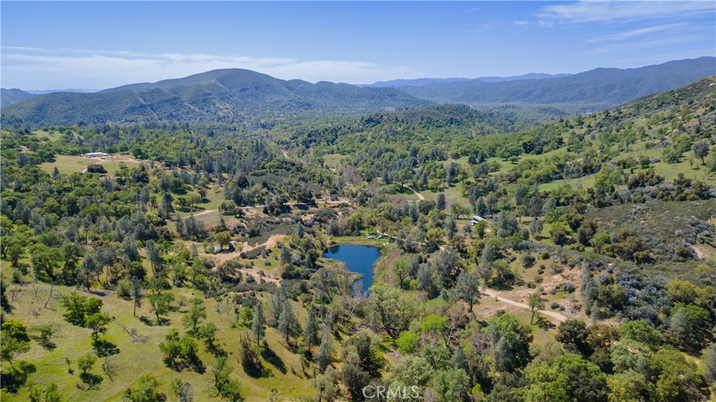 0 Av Ranch Road Greenfield, CA 93927 - Photo 18 of 26 a view of a lush green field with a mountain in the background