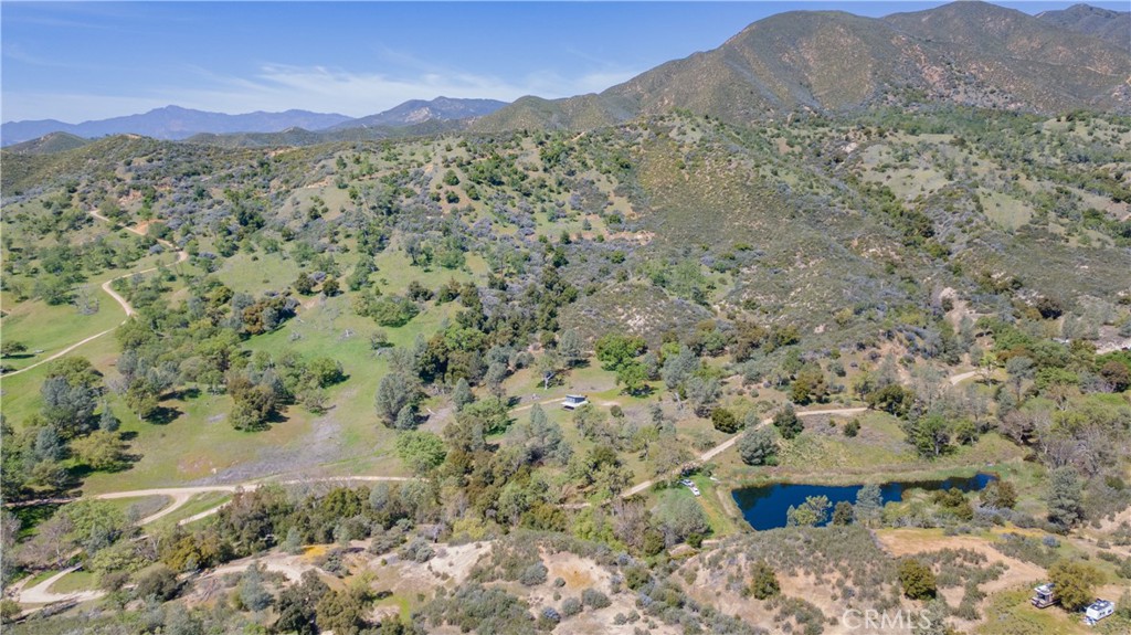 0 Av Ranch Road Greenfield, CA 93927 - Photo 20 of 26 a view of a field with a mountain in the background