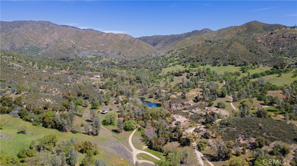 0 Av Ranch Road Greenfield, CA 93927 - Photo 21 of 26 a view of a forest with mountains in the background