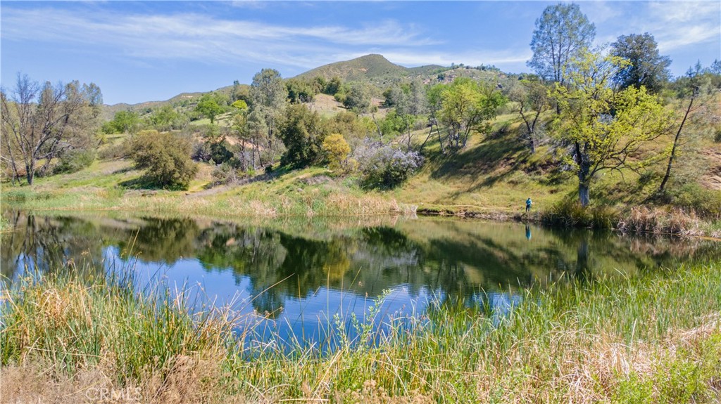 0 Av Ranch Road Greenfield, CA 93927 - Photo 26 of 26 a view of a lake with a mountain in the background