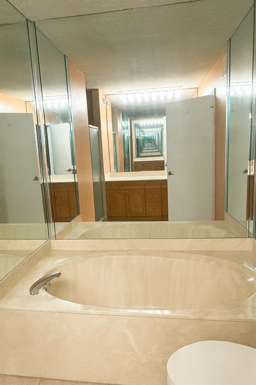 9778 Nickels Boulevard, Unit 504 Boynton Beach, FL 33436 - Photo 14 of 31 a bathroom with a sink and mirror