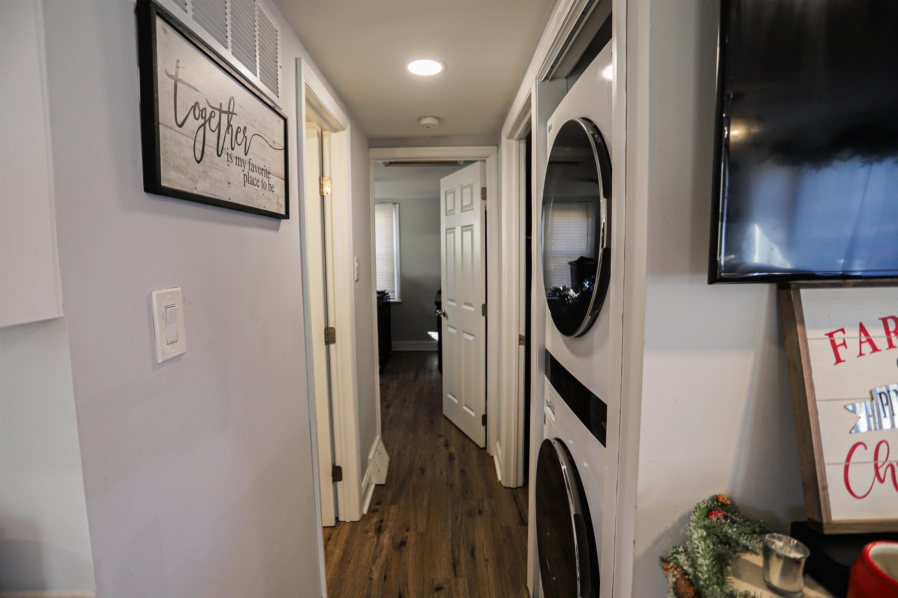 101 Sunset Road Corbin City, NJ 08270 - Photo 12 of 21 a view of a hallway with washer and dryer