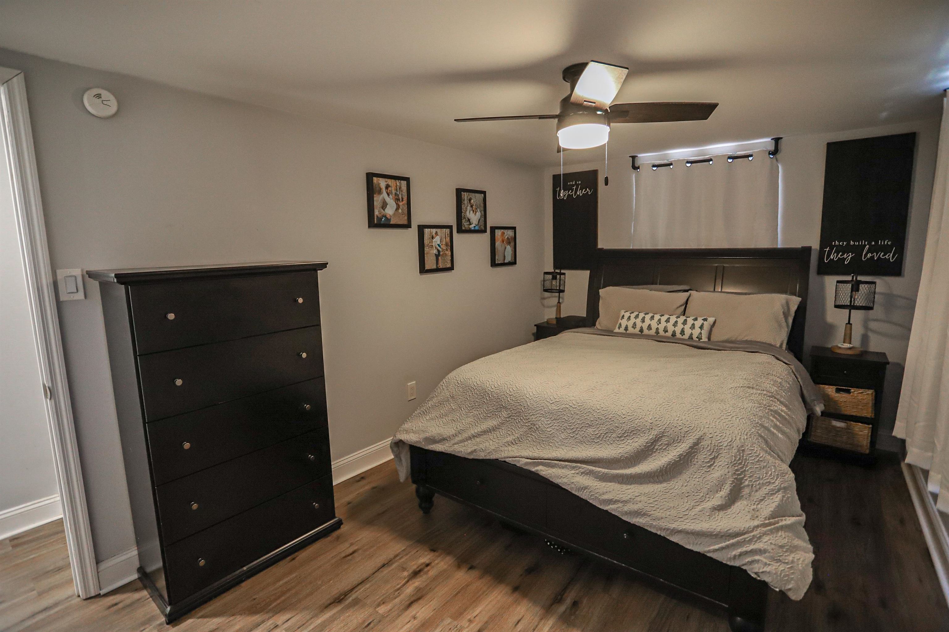 101 Sunset Road Corbin City, NJ 08270 - Photo 13 of 21 a bedroom with a bed and a walk in closet