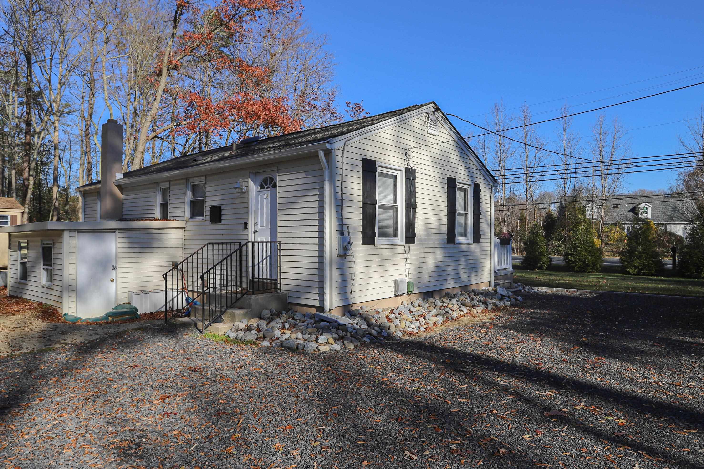 101 Sunset Road Corbin City, NJ 08270 - Photo 17 of 21 a view of a house with a yard