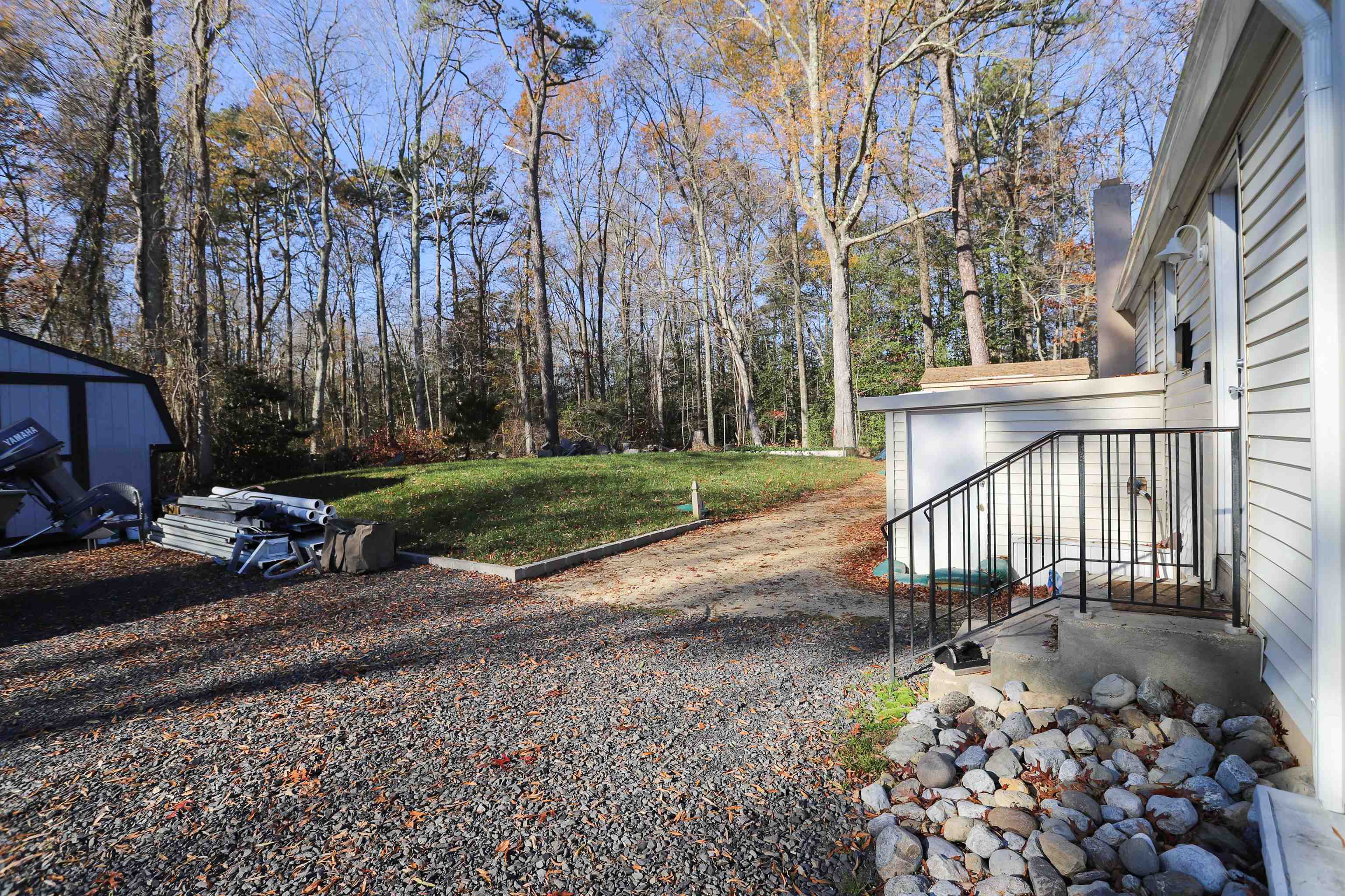 101 Sunset Road Corbin City, NJ 08270 - Photo 18 of 21 a view of a pathway with a yard