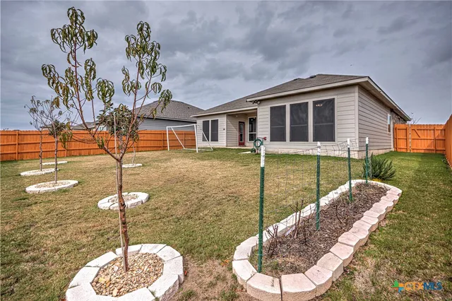 a very nice looking house with a large window