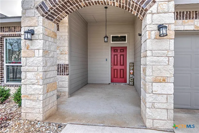 a view of a room with windows