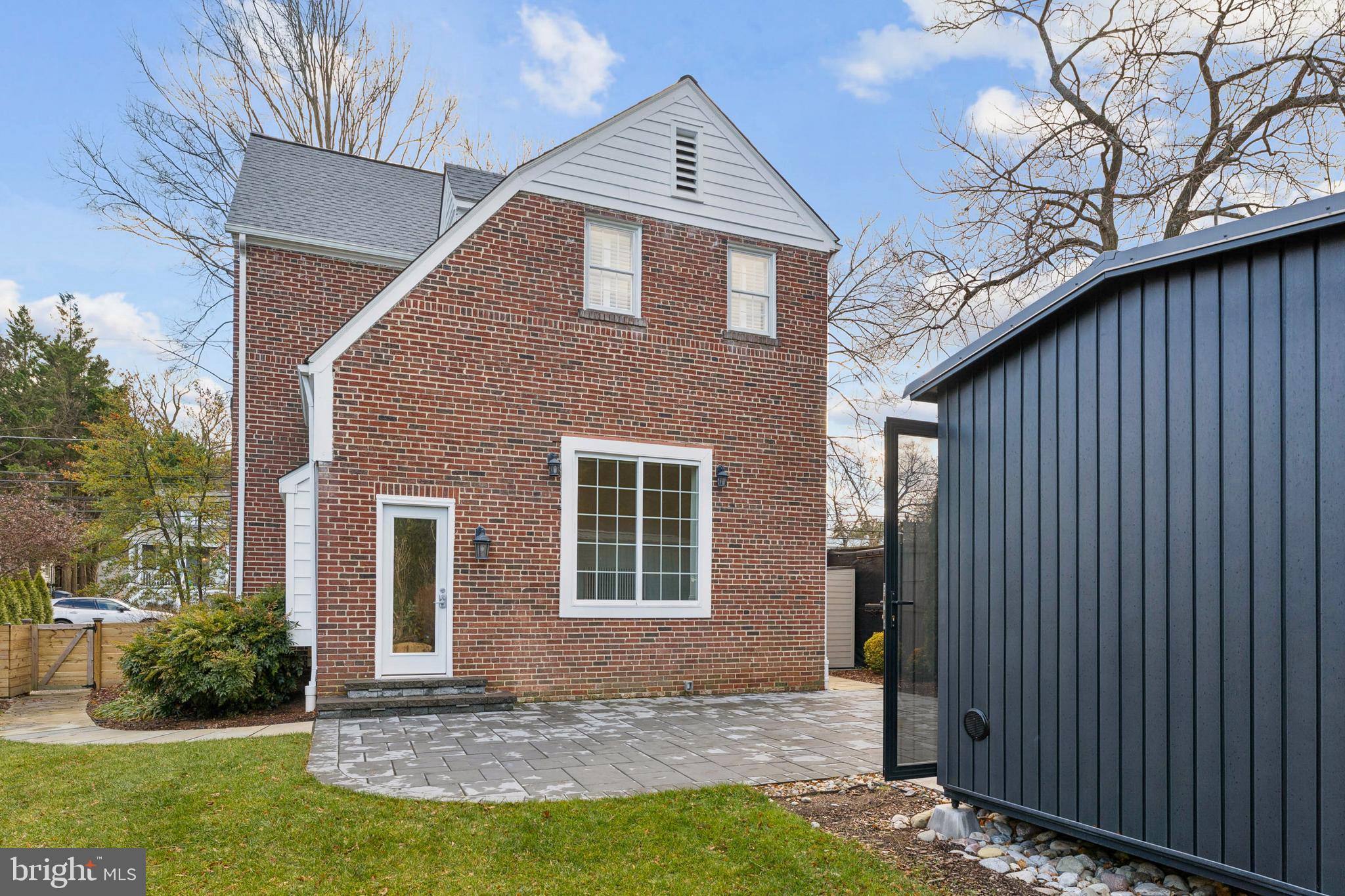 3515 Taylor Street Chevy Chase, MD 20815 - Photo 34 of 40 a front view of a house with a yard