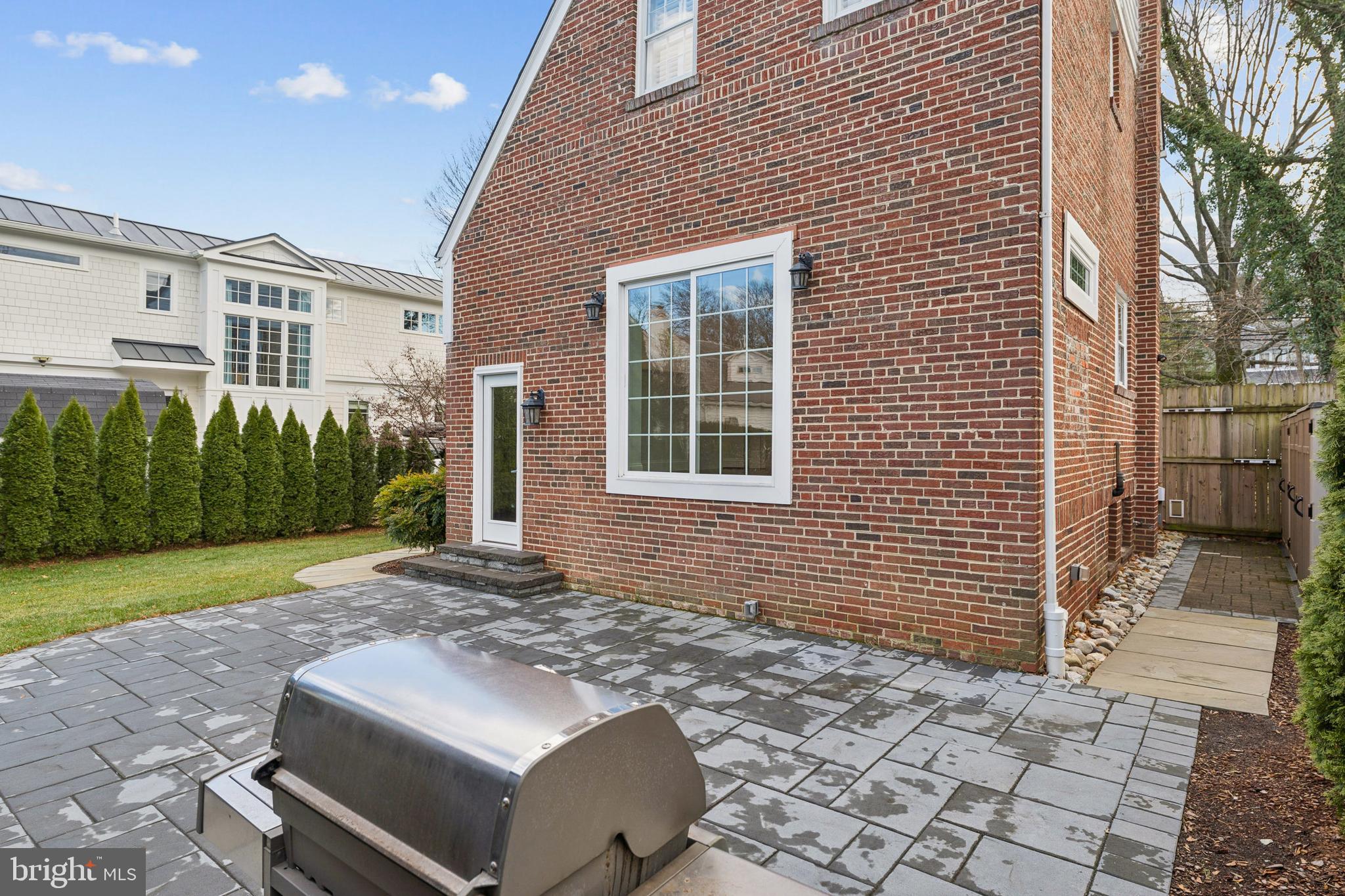 3515 Taylor Street Chevy Chase, MD 20815 - Photo 35 of 40 a front view of a house with garden