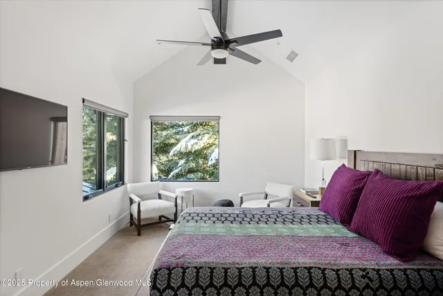 a bathroom with a double vanity sink toilet and shower
