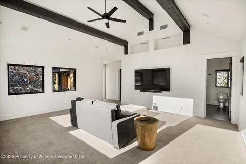 a bathroom with a sink vanity granite and a toilet