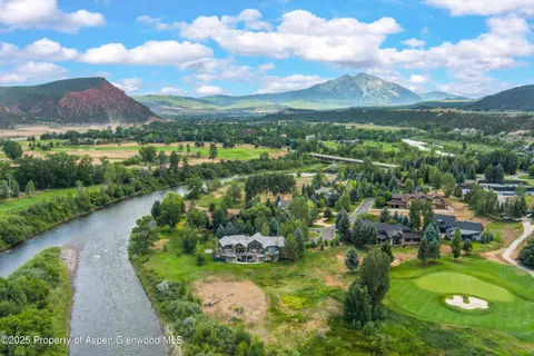 a view of a lake with a city