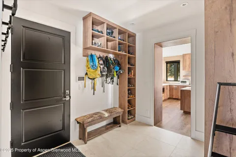 a kitchen with a sink and a washer dryer