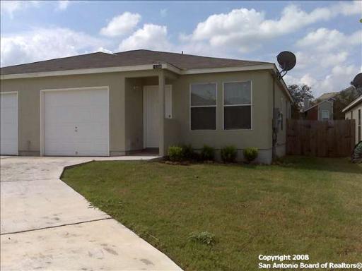 11206 Center Point Road San Antonio, TX 78233 - Photo 1 of 5 a front view of a house with garden