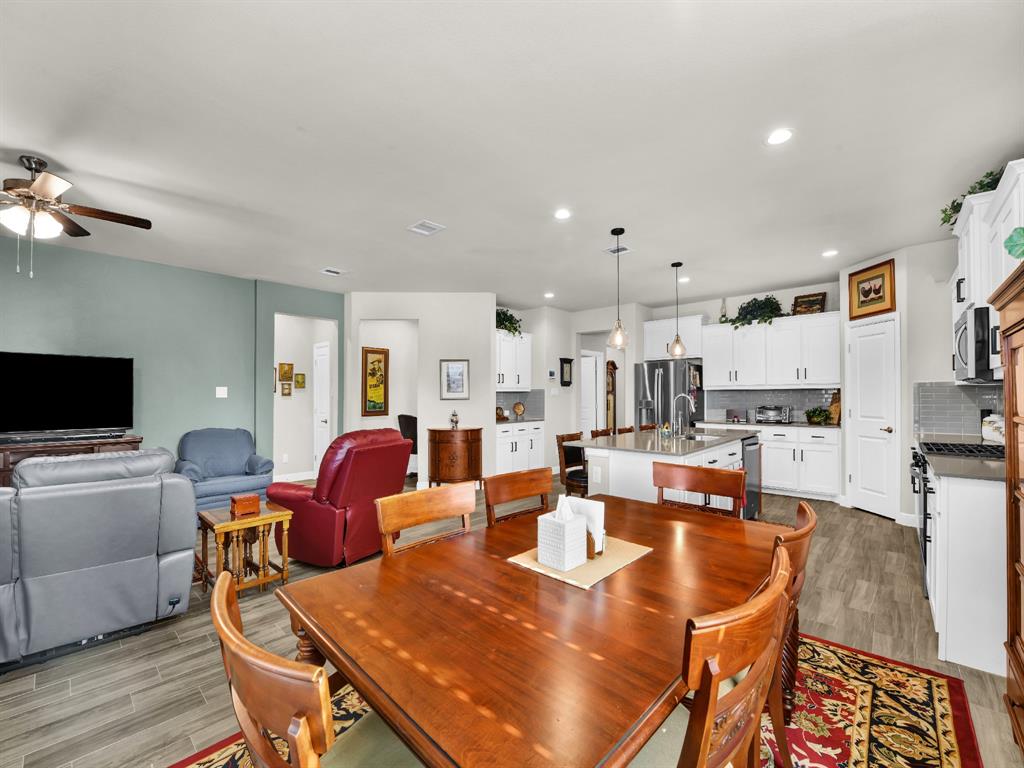 2364 Waggoner Rnch Drive Weatherford, TX 76087 - Photo 15 of 30 a view of kitchen with dining table and chairs