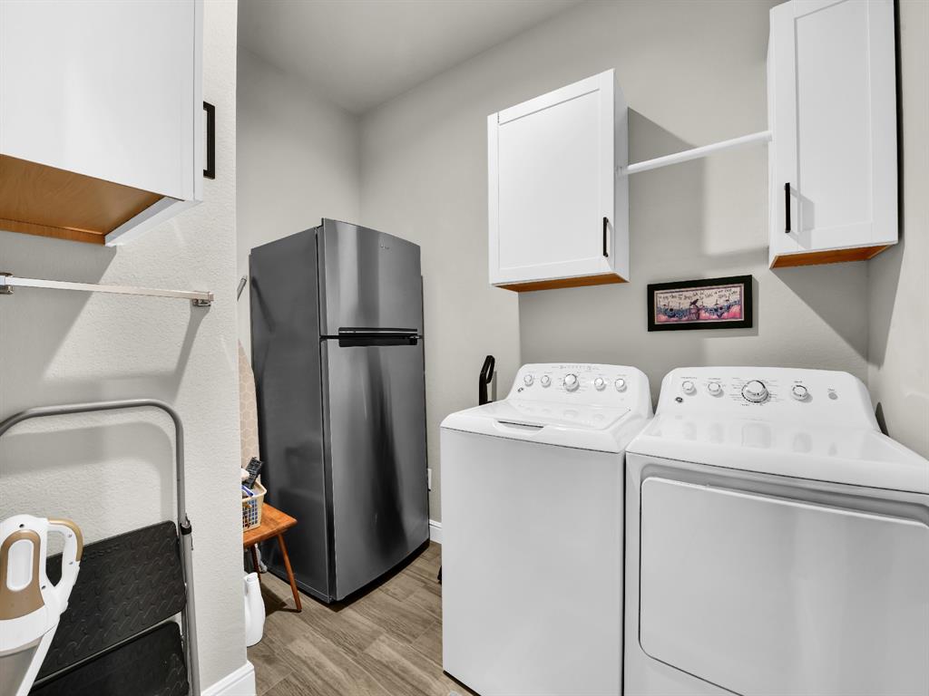 2364 Waggoner Rnch Drive Weatherford, TX 76087 - Photo 29 of 30 a utility room with dryer and washer