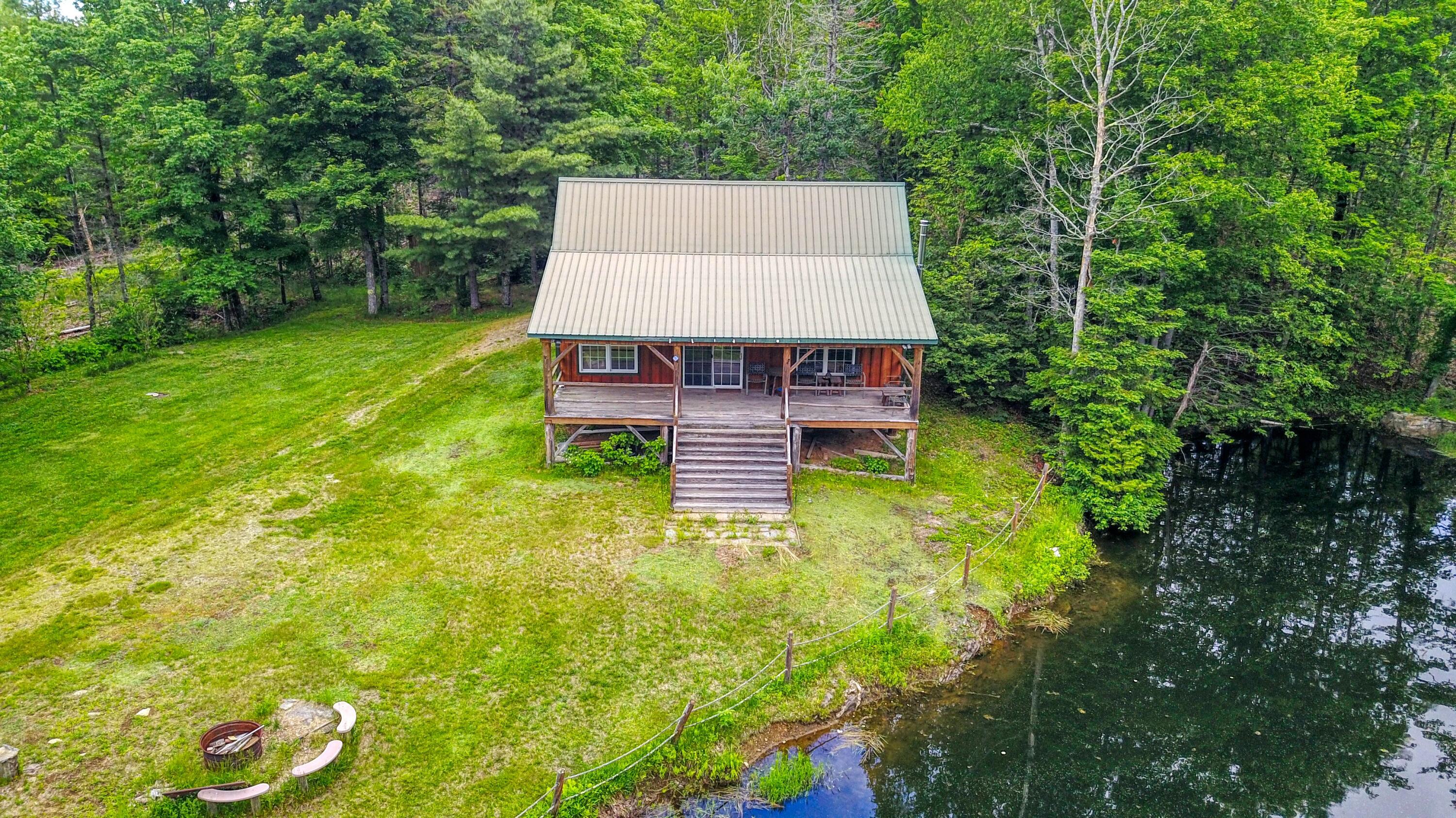 Lot 17 East Thorndike Road Thorndike, ME 04986 - Photo 8 of 31 Front View of Cabin