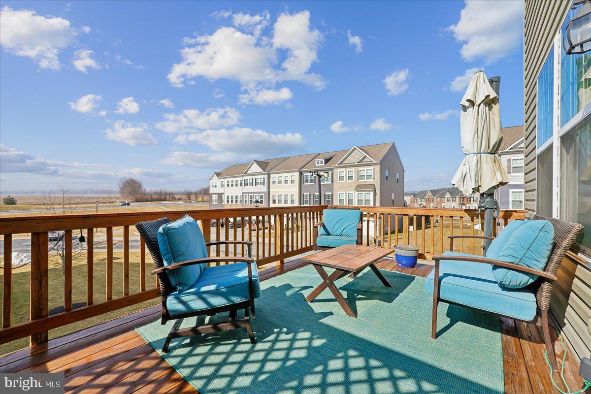 6501 Britannic Place Frederick, MD 21703 - Photo 25 of 64 a terrace with outdoor seating and city view