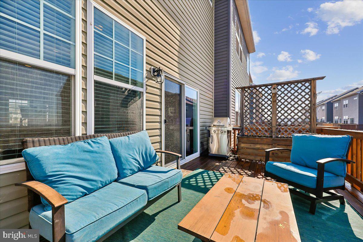6501 Britannic Place Frederick, MD 21703 - Photo 28 of 64 a backyard of a house with seating space