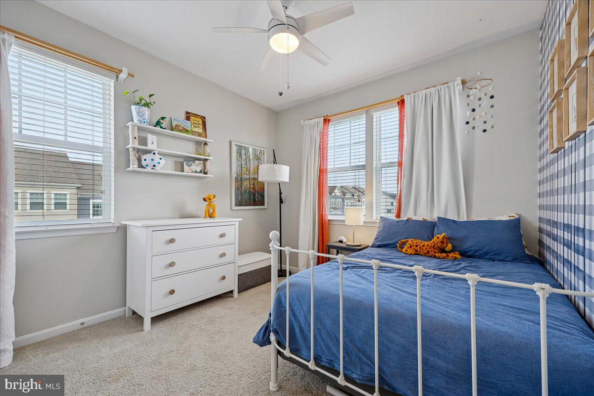 6501 Britannic Place Frederick, MD 21703 - Photo 39 of 64 a bed room with a bed and a window
