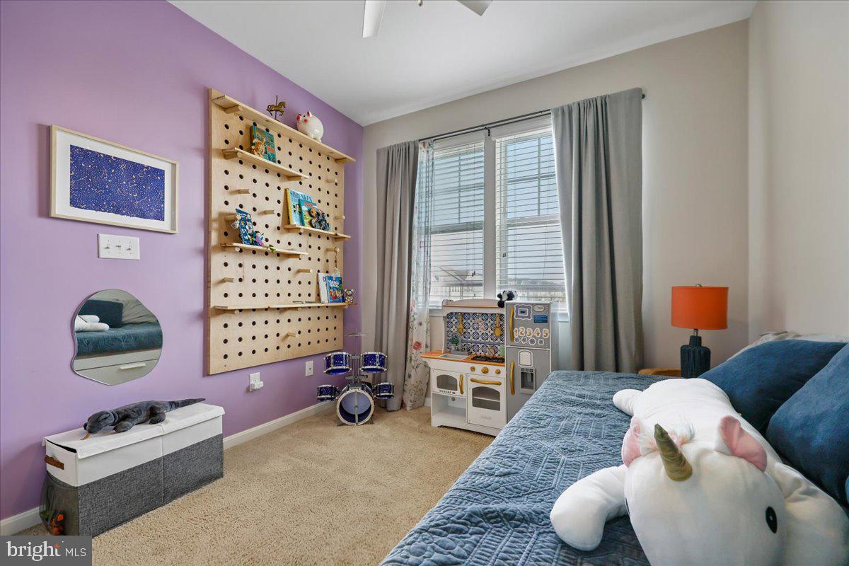 6501 Britannic Place Frederick, MD 21703 - Photo 42 of 64 a bedroom with furniture and a window