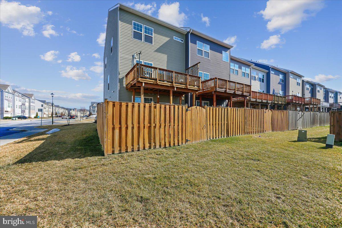 6501 Britannic Place Frederick, MD 21703 - Photo 55 of 64 a view of a house with a yard