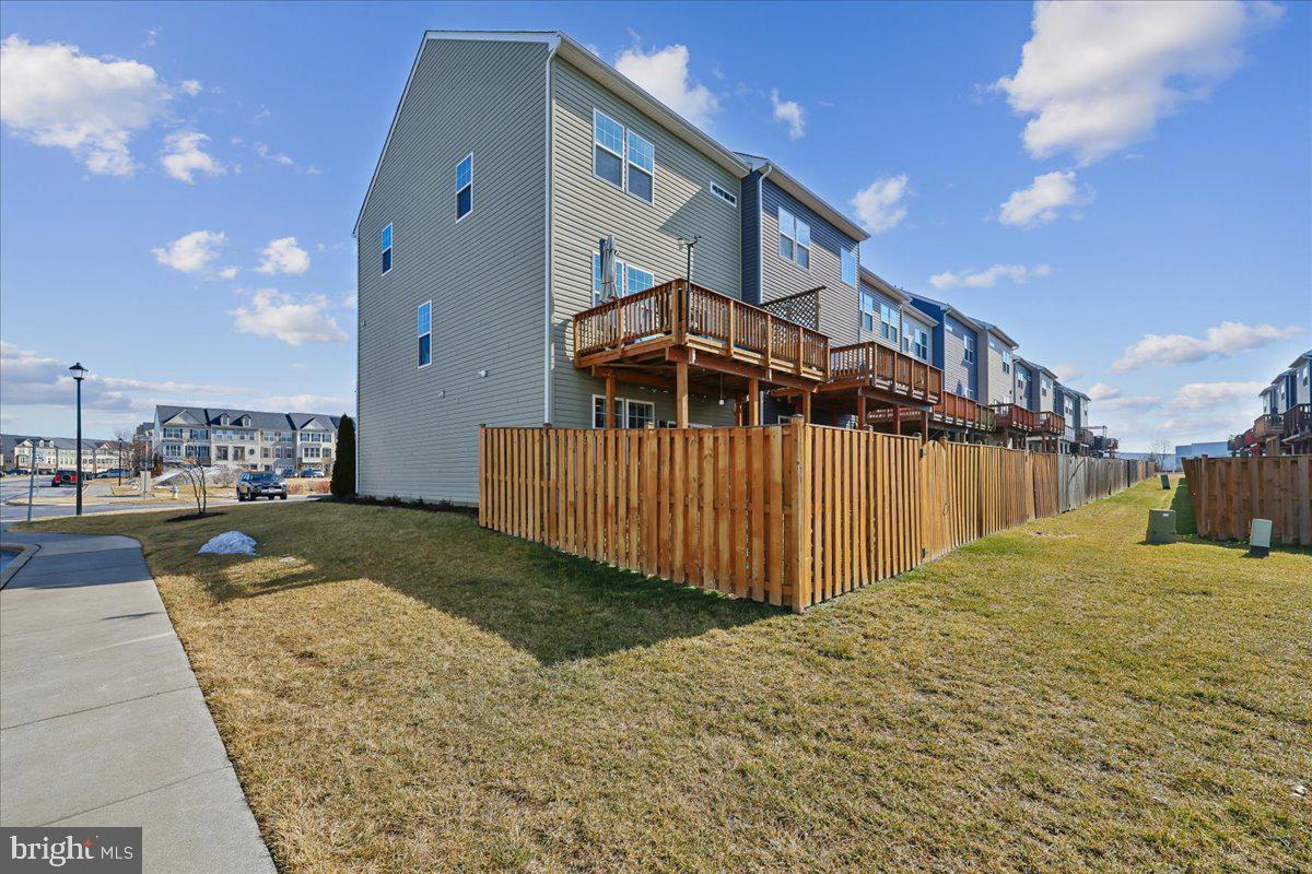 6501 Britannic Place Frederick, MD 21703 - Photo 56 of 64 a view of a backyard of the house