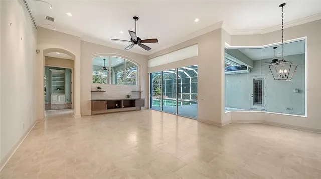 a view of a living room and entry way