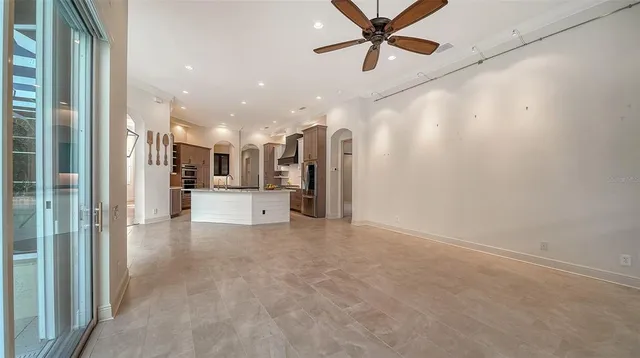 a kitchen with stainless steel appliances a sink stove and refrigerator