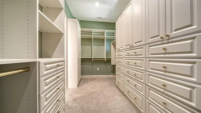 a view of a swimming pool with a porch