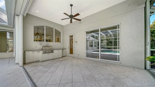 a view of a garden with a building in the background