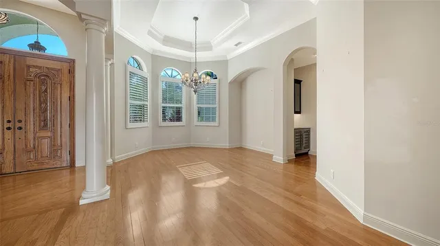 a view of room with furniture and a ceiling fan