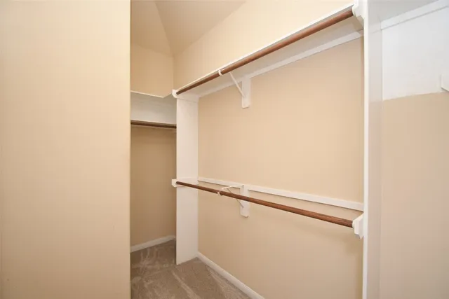 a view of a room with racks on the wall