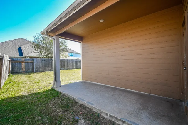 a house with yard in front of it