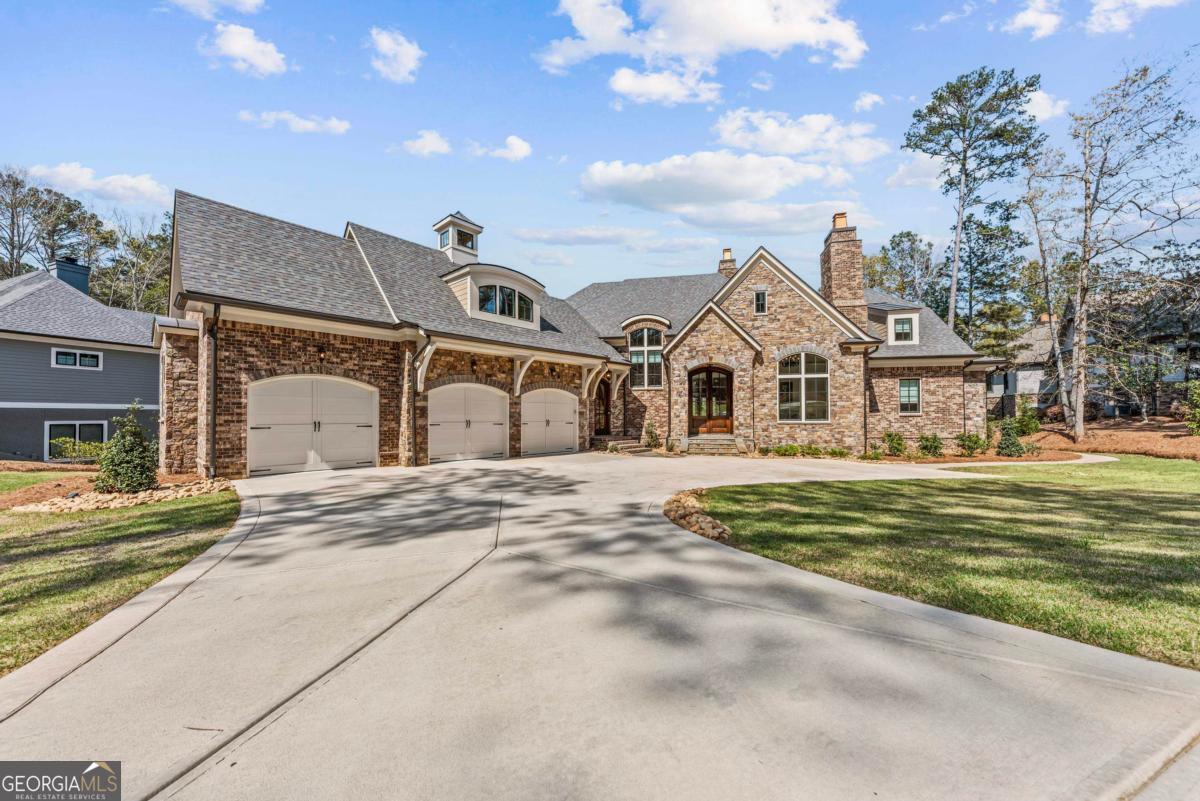 5010 Browns Ford Road Greensboro, GA 30642 - Photo 13 of 67 a front view of a house with a yard