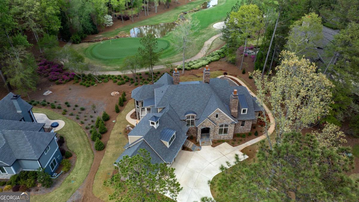 5010 Browns Ford Road Greensboro, GA 30642 - Photo 16 of 67 an aerial view of residential house with outdoor space and swimming pool