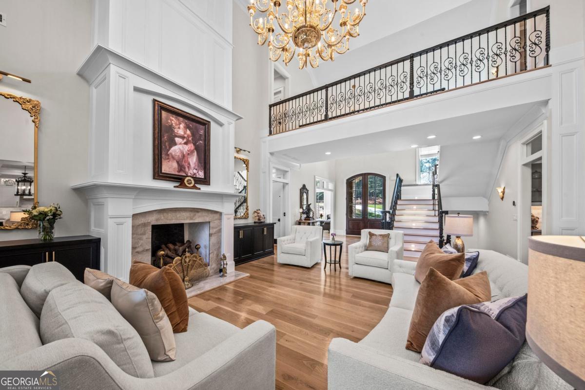 5010 Browns Ford Road Greensboro, GA 30642 - Photo 23 of 67 a living room with furniture mirror and fireplace