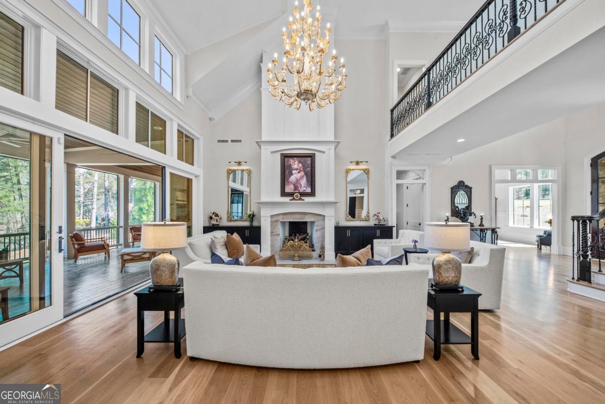 5010 Browns Ford Road Greensboro, GA 30642 - Photo 24 of 67 a living room with fireplace furniture and a large window