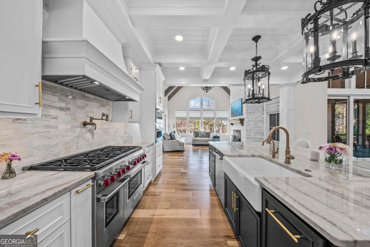 5010 Browns Ford Road Greensboro, GA 30642 - Photo 26 of 67 a kitchen with stainless steel appliances granite countertop a sink stove and cabinets