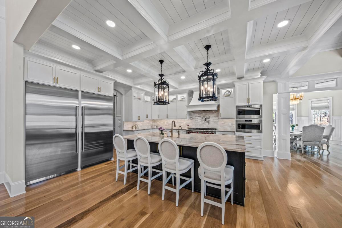 5010 Browns Ford Road Greensboro, GA 30642 - Photo 27 of 67 a large kitchen with a table and chairs