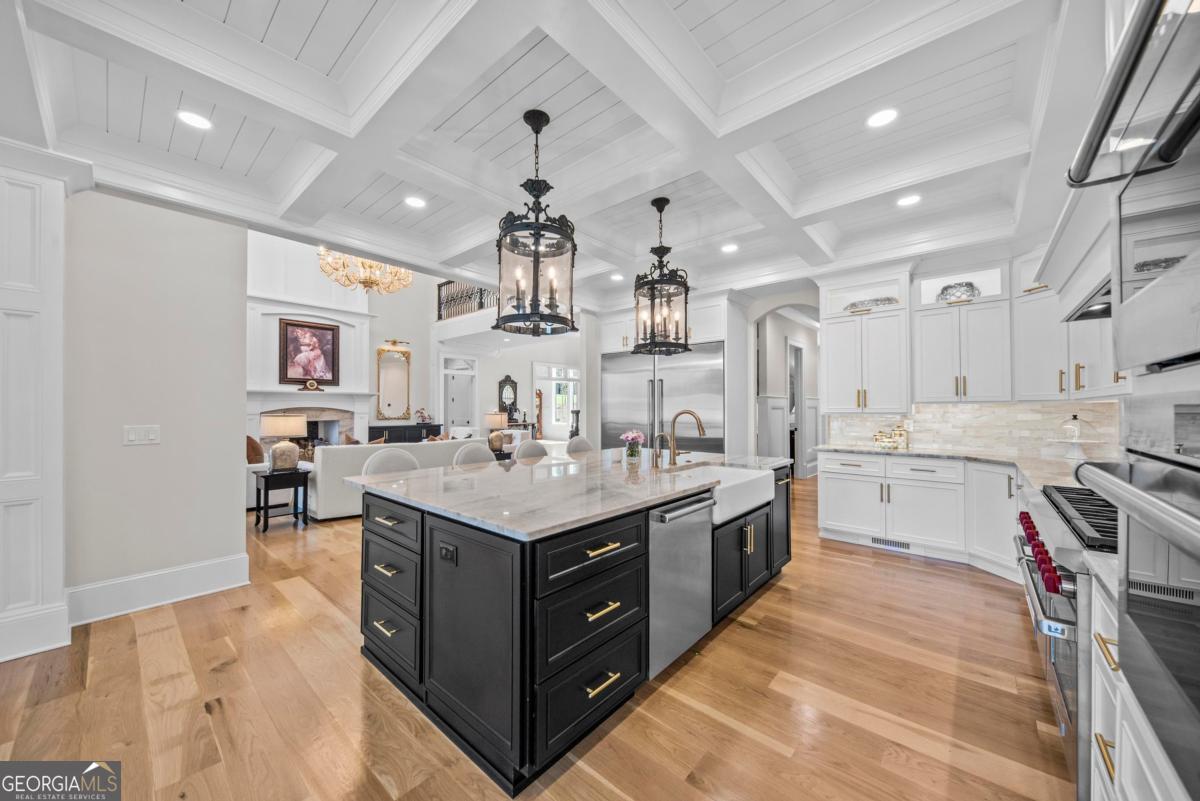 5010 Browns Ford Road Greensboro, GA 30642 - Photo 29 of 67 a large kitchen with a lot of counter space and a sink