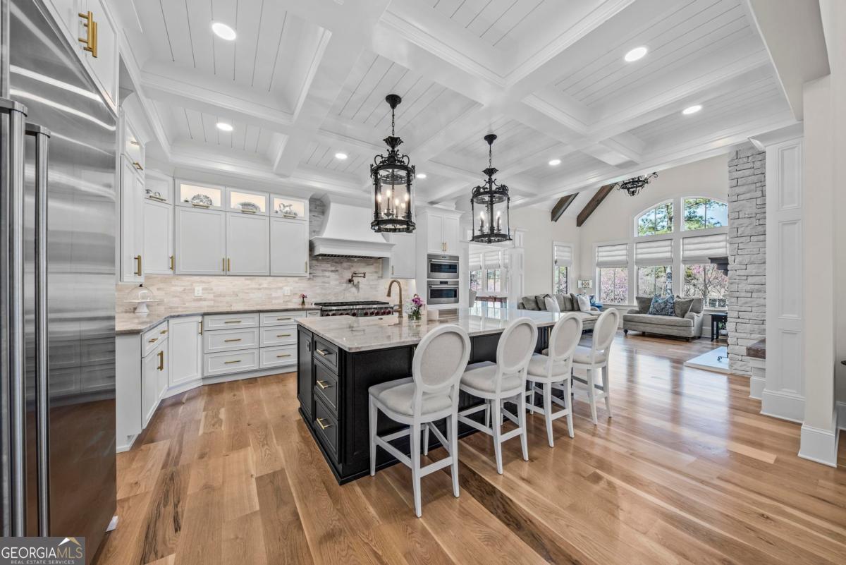 5010 Browns Ford Road Greensboro, GA 30642 - Photo 31 of 67 a large kitchen with a table and chairs