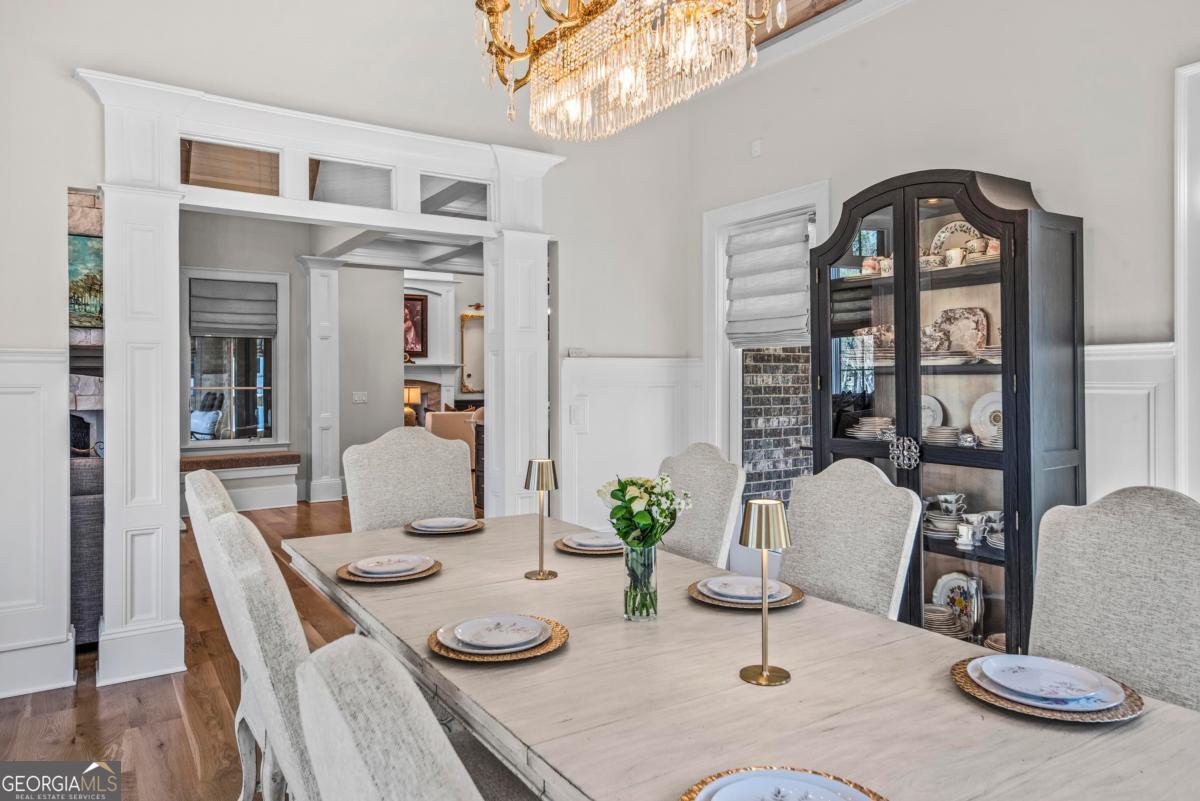 5010 Browns Ford Road Greensboro, GA 30642 - Photo 35 of 67 a view of a dining room with furniture a rug and wooden floor
