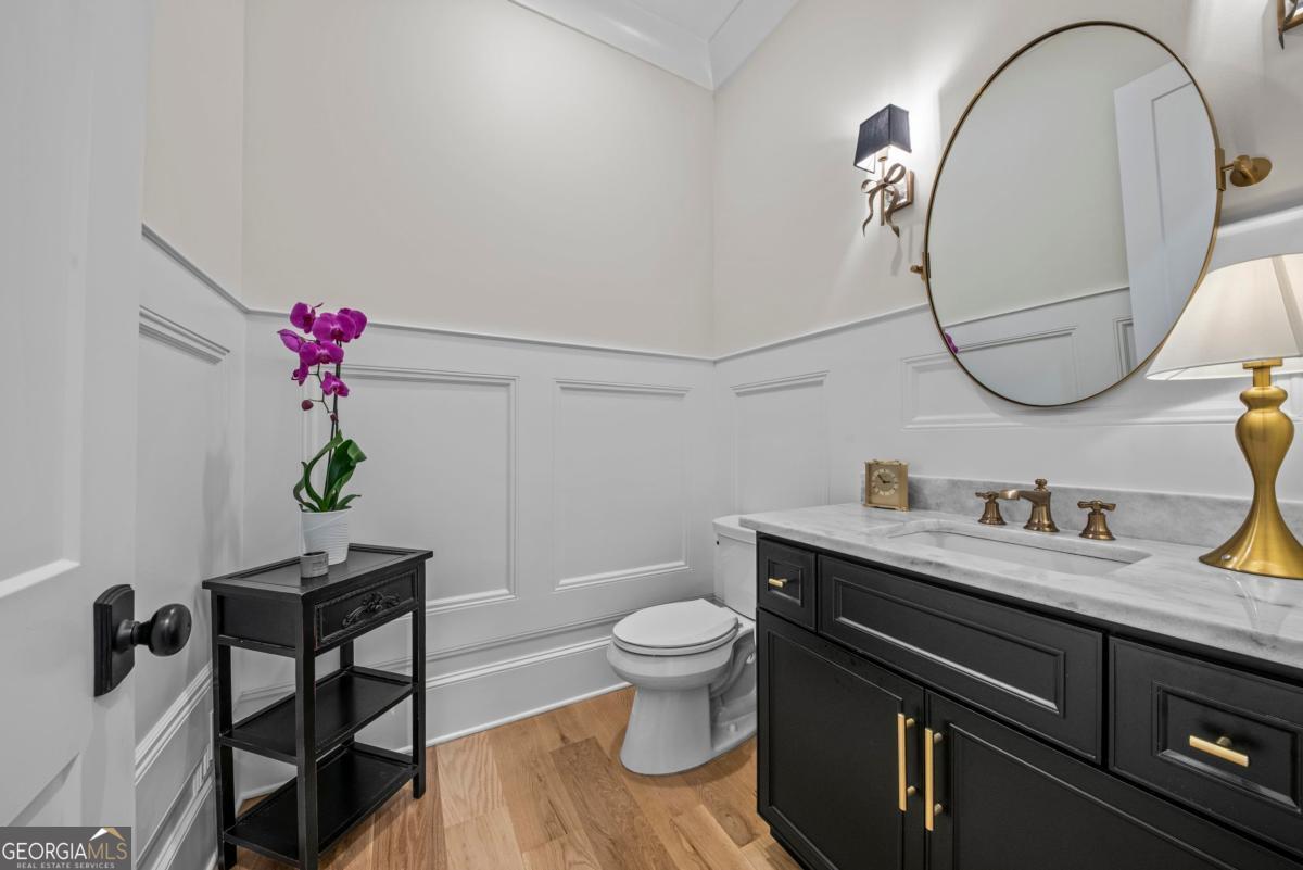 5010 Browns Ford Road Greensboro, GA 30642 - Photo 37 of 67 a bathroom with a toilet sink and mirror
