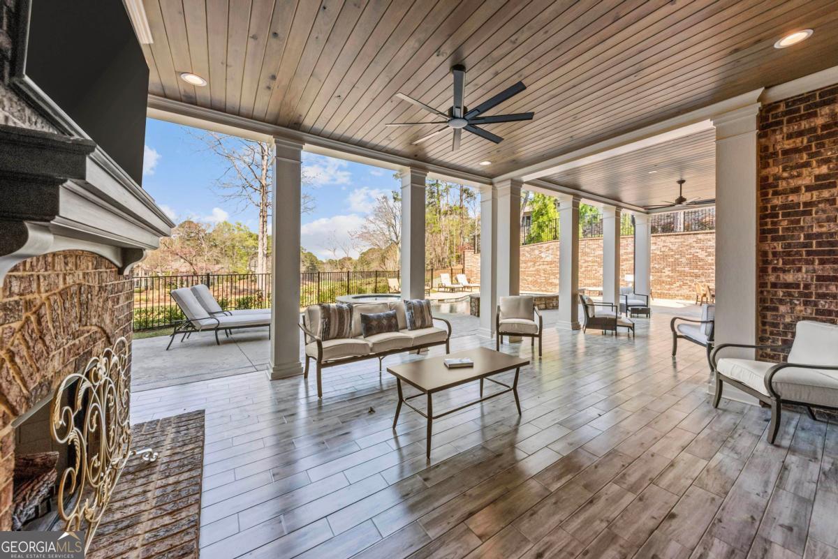 5010 Browns Ford Road Greensboro, GA 30642 - Photo 38 of 67 a living room with furniture and a large window