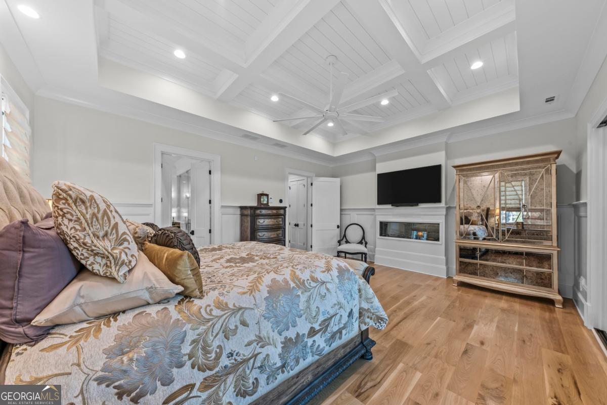 5010 Browns Ford Road Greensboro, GA 30642 - Photo 45 of 67 a bedroom with a bed and a flat screen tv